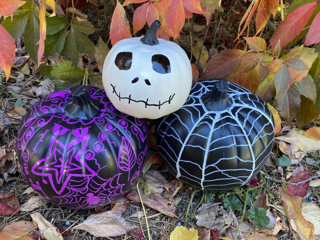 Photo of pumpkins decorated using sharpie marker